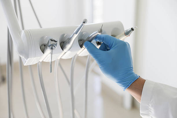 Professional Tooth Extraction technician working in Albany, LA